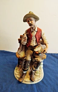 Figure of Old Man Sitting on a Bench - Picture 1 of 4