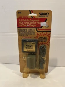 NEU Nikko 4,8 Volt wiederaufladbarer NiCd Turbo Akkupack und Schnellladegerät 1249 - Bild 1 von 2