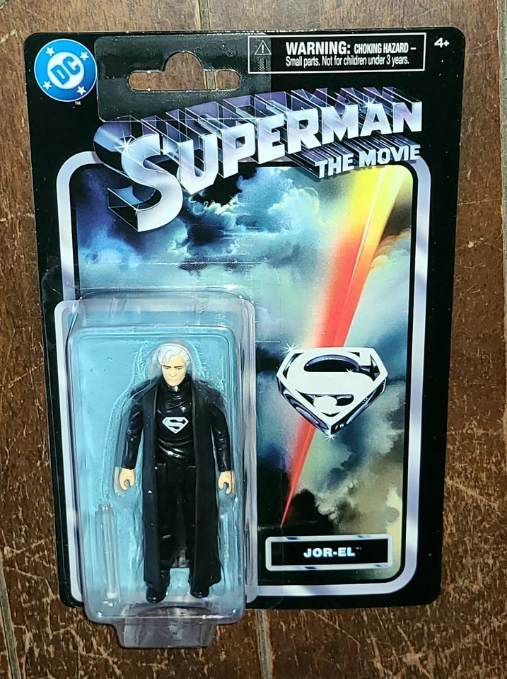 Figura DC Superman La Película (2025) JOR-EL (Traje Negro) 4" con Accesorio #20154054 Foto 1 de 2
