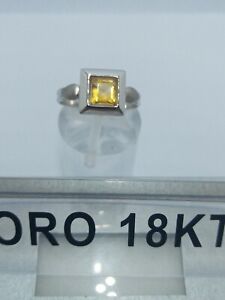 Anello in oro bianco 750 18 carati con incastonata una pietra topazio grammi 2,4