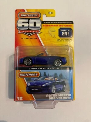 Matchbox 2012 60 aniversario Aston Martin DBS VOLANTE PÚRPURA 12/24 Foto 1 de 3