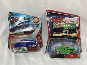 Disney Pixar CARS Movie Die Cast TJ Hummer And Doc Hudson 2009 - Picture 1 of 12