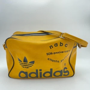 Borsone ADIDAS Vintage Giallo NABC 50° Anniversario 1977 Made Jugoslavia - Foto 1 di 11