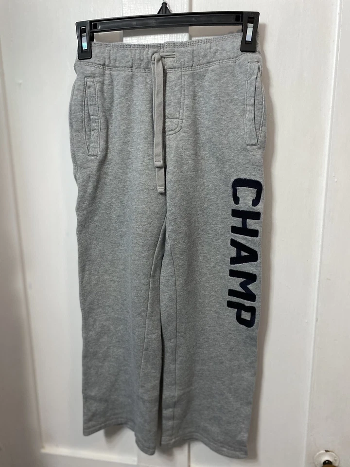 Pantalones deportivos de colección 2012 Gymboree Boys talla 8 grises con cordón azul “Champ” usados en excelente estado Foto 1 de 4
