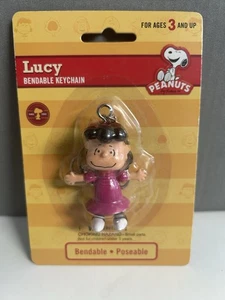VINTAGE NJ CROCE...LUCY.... Peanuts Gang biegsamer beweglicher Schlüsselanhänger... (NEU) - Bild 1 von 2