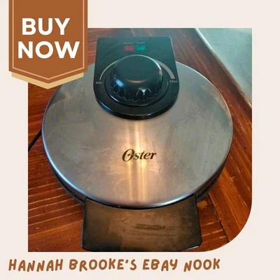 Gofrera belga Oster acero inoxidable negra CKSTWF1-DM redonda 4 secciones... Foto 1 de 4