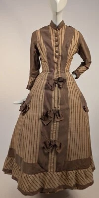 LATE 1860’S PINSTRIPED TAN BOMBAZINE DRESS W BOWS + SIDE POCKET DETAIL - Image 1 of 4