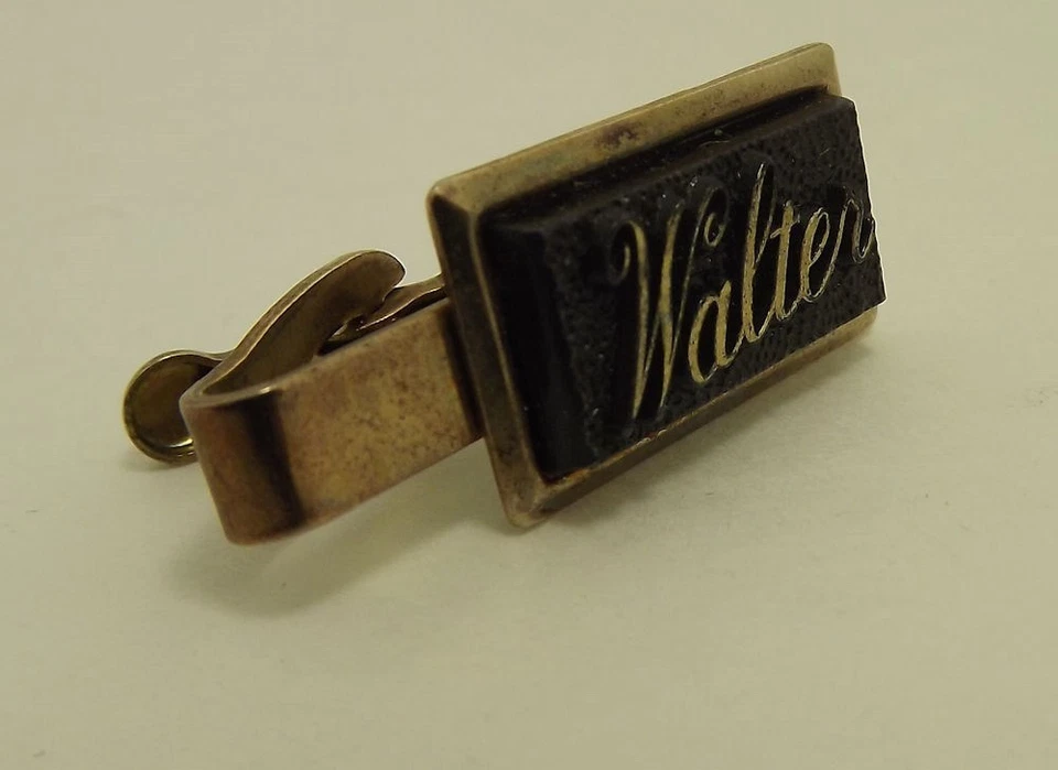 Cierre de corbata de plástico con nombre Walter tono dorado ornamentado Foto 1 de 1