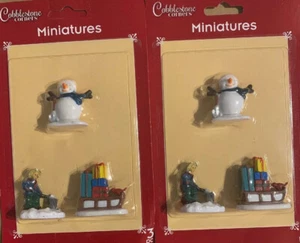 KOPFSTEINPFLASTER ECKEN MINIATUREN DORF FIGUREN Schneemann, Schlitten mit Geschenk Reiniger - Bild 1 von 4