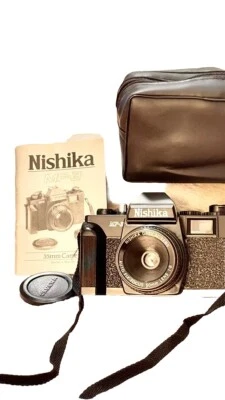 Cámara fotográfica Nishika MF-3 35 mm con lente de enfoque fijo automático 50 mm F/6 SIN PROBAR años 80 Foto 1 de 4