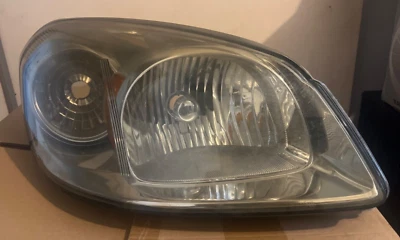 Chevy cobalt headlamp, right side used. Like used part with cosmetic blemishes. - Image 1 of 4