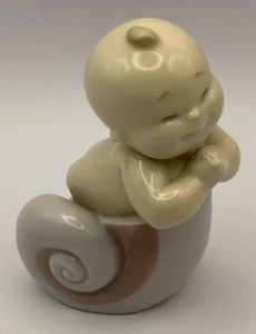 NAO by Lladro ~ Where Do Babies Come From?’  From A Snail Shell - Picture 1 of 4