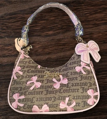 Cartera Viral Juicy Couture Simply Sweet Signature marrón con lazos rosas ~ nueva con etiquetas Foto 1 de 3