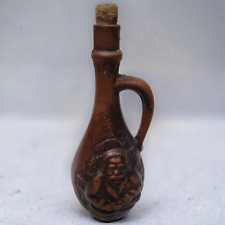 Vintage Brown Ceramic Wine Bottle with Cork Stopper and Intricate Designs Israel