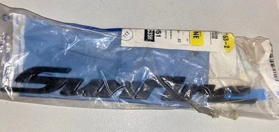 1998-2002 GENUINE GM PONTIAC SUNFIRE NAMEPLATE, NEW OEM PART, P/N 22618750 - Image 1 of 4