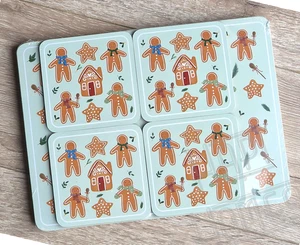 Juego de 4 manteles individuales y 4 posavasos de pan de jengibre alfombrillas de Navidad con respaldo de corcho - Imagen 1 de 4