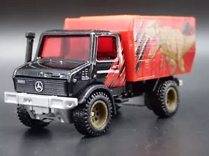 Mercedes-Benz Unimog U 1300L Jurassic World 1:64 Escala Diorama Coche Modelo - Imagen 1 de 7
