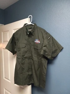 NEW - THE GUN SHOP & GUN RANGE LEESBURG FL SHIRT BY BLACKHAWK SIZE M - Picture 1 of 7