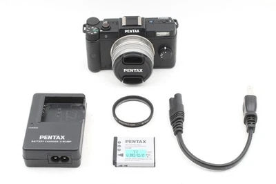 Juego de cargador de batería de lente Shutter 142 PENTAX Q SMC 8,5 mm 1:1,9 Foto 1 de 4