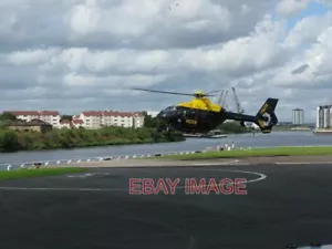 PHOTO SCOTTISH AMBULANCE SERVICE HELIPORT STRATHCLYDE POLICE HELICOPTER LANDING - Picture 1 of 1