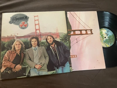 ОРИГИНАЛЬНАЯ ВИНИЛОВАЯ ПЛАСТИНКА AMERICA HEART VG++/NM — ПРОДЮСЕР ДЖОРДЖ МАРТИН - Изображение 1 из 3