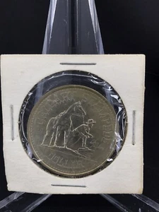 1978 Calgary Stampede Dollar Commonwealth Games Coin - Picture 1 of 4