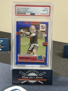 2022 Donruss #374 Brock Purdy Press Proof Blue PSA 8 NM-MT - Bild 1 von 2