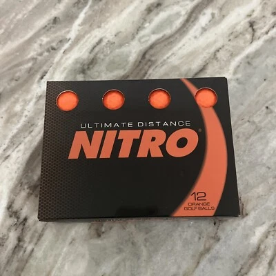 NUEVAS pelotas de golf Nitro Golf Ultimate Distance, naranja, paquete de 12 faltan 1 Foto 1 de 4