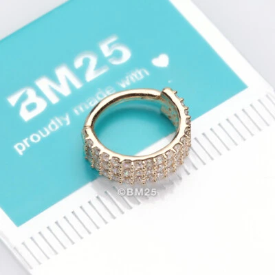 Anillo aro clicker sin costuras gemas triple forradas brillante de oro de 14 quilates Foto 1 de 4