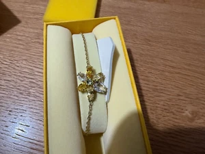 SWAROVSKI GEMA YELLOW FLOWER GOLD TONE PLATED BRACELET 5652820 NEW - Picture 1 of 2