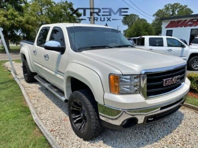 Juego de llamaradas de guardabarros estilo extendido pintable negro 07-13 GMC Sierra 1500 platón corto Foto 1 de 3