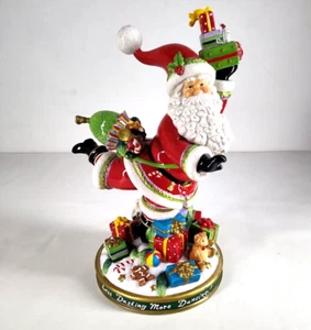 Estatuilla centro de mesa de Navidad de porcelana Leapin Santa de Ingrid Slyder 17" - Imagen 1 de 11