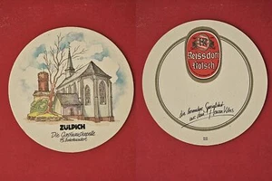 Reissdorf Zülpich capilla posada cervecería tapa de cerveza montaña rusa beermat - Imagen 1 de 1