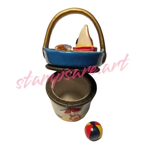 Caja de baratijas/anillo con cubo de playa - Imagen 1 de 5