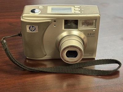 Camera HP PhotoSmart 735  3.2MP 5.8-17.4 Zoom Lens Digital Silver - Tested - Image 1 of 4