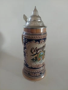 Cerveza Olympia Stein Gerz de colección con tapa de peltre de Alemania usada excelente estado - Imagen 1 de 9