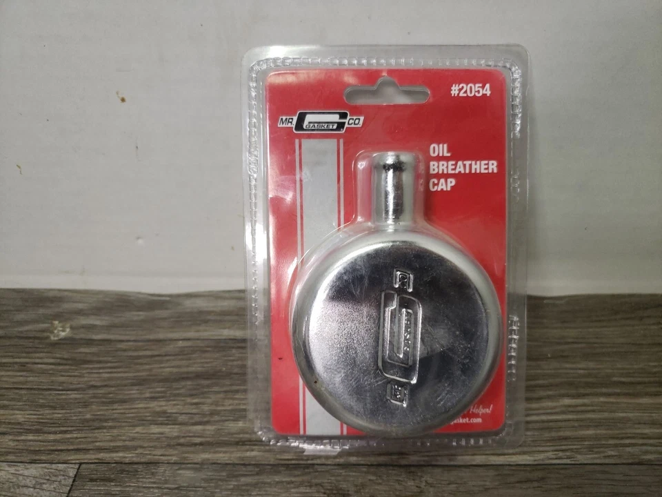 Tapa respiradora de aceite cromado estilo push-on alto rendimiento Mr.Gasket 2054 Foto 1 de 3