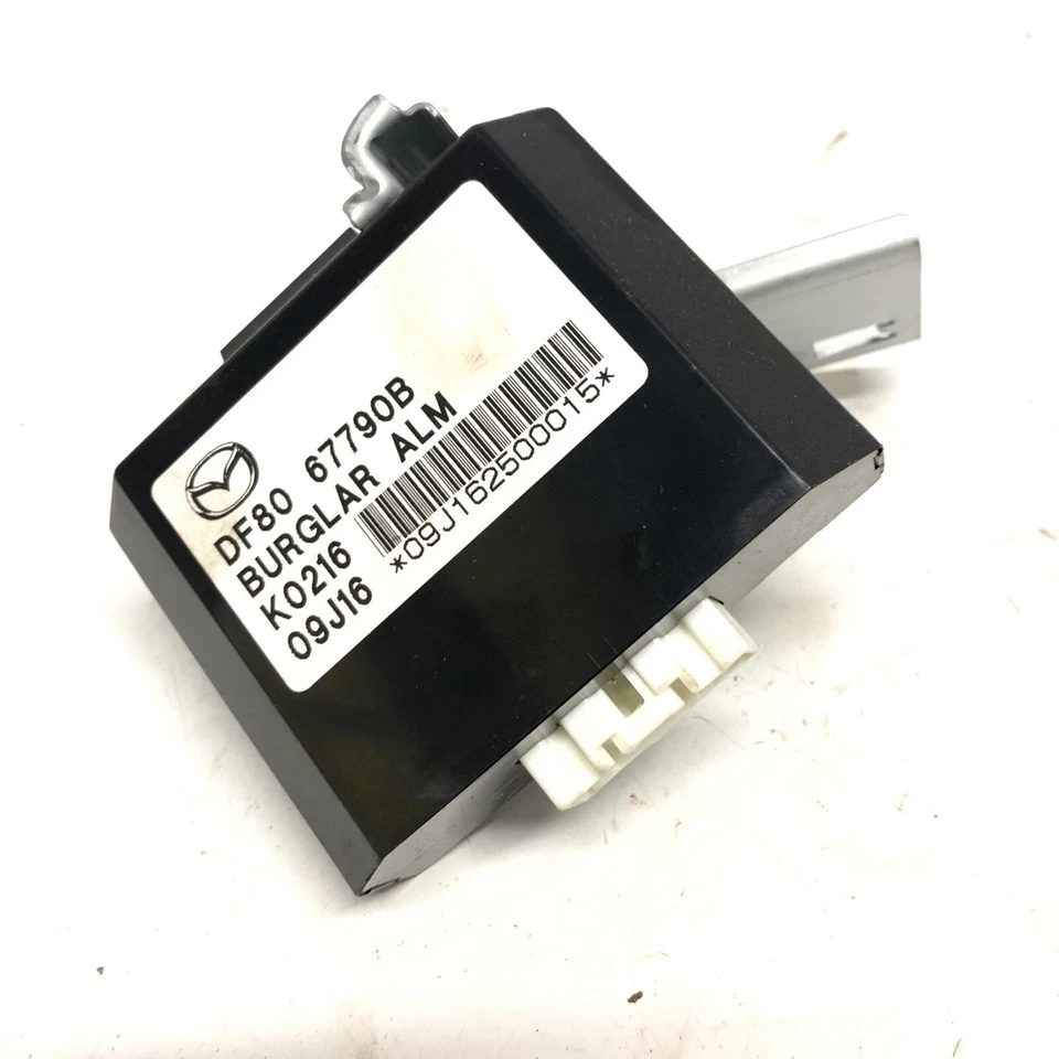 UNIDAD MÓDULO CONTROL ECU SIRENA ALARMA INTERIOR GENUINA MAZDA 2 DE 2007-2014 Foto 1 de 1