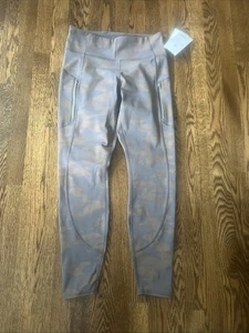 NWT ATHLETA RAINIER REFLECTIVE TIGHT size M - Picture 1 of 10