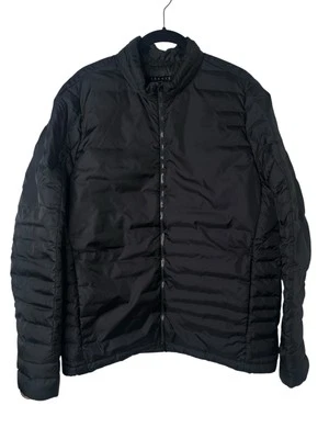 Chaqueta acolchada grande Theory L para mujer abrigo de plumón de nailon negro minimalista Foto 1 de 4