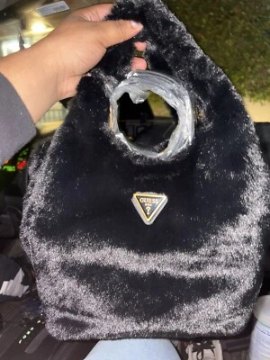 adivinar bolso nuevo con etiquetas Foto 1 de 3