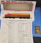 Proto 1000 Series - ERIE BUILT LOCOMOTIVE-RED/YELLOW-HO GA. - New in the Box