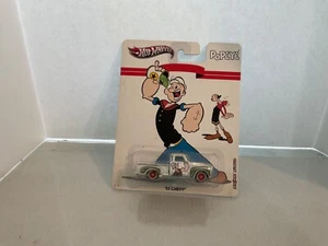 Hot Wheels Popeye The Sailor '52 Chevy w/ Real Riders Pop Culture 2012 New - Picture 1 of 2