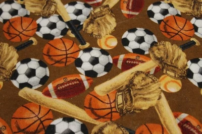 Tela de franela de algodón marrón temática deportiva de 1 7/8 yardas Foto 1 de 4