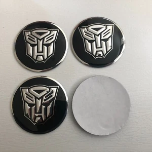 4x Transformers Wheel Centre Cap Sticker New 56mm Hub Stickers Black / Silver - Picture 1 of 4