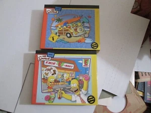 The Simpsons “Surfari” & “Dinner with Dad” 63 Pc Jigsaw Puzzle LOT 2007 SEALED - Picture 1 of 4
