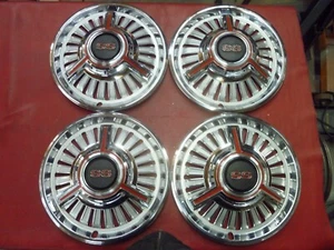 VINTAGE NOS 1965 CHEVY NOVA CHEVELLE MALIBU SS SPINNER HUBCAPS WHEEL COVERS - Picture 1 of 12