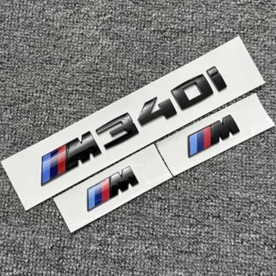 Guardabarros trasero negro emblema M para BMW Serie 3 G20 M340i xDrive insignia deportiva Foto 1 de 4