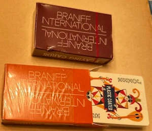 Lot of 2 Sealed Braniff Playing Cards - burnt orange and dark burgundy UT? ATM? - Picture 1 of 2