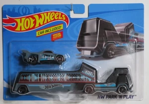 Hot Wheels Super Rigs camión transporte y juego de carros HW PARK 'N PLAY GBF14 BDW51 - Imagen 1 de 2